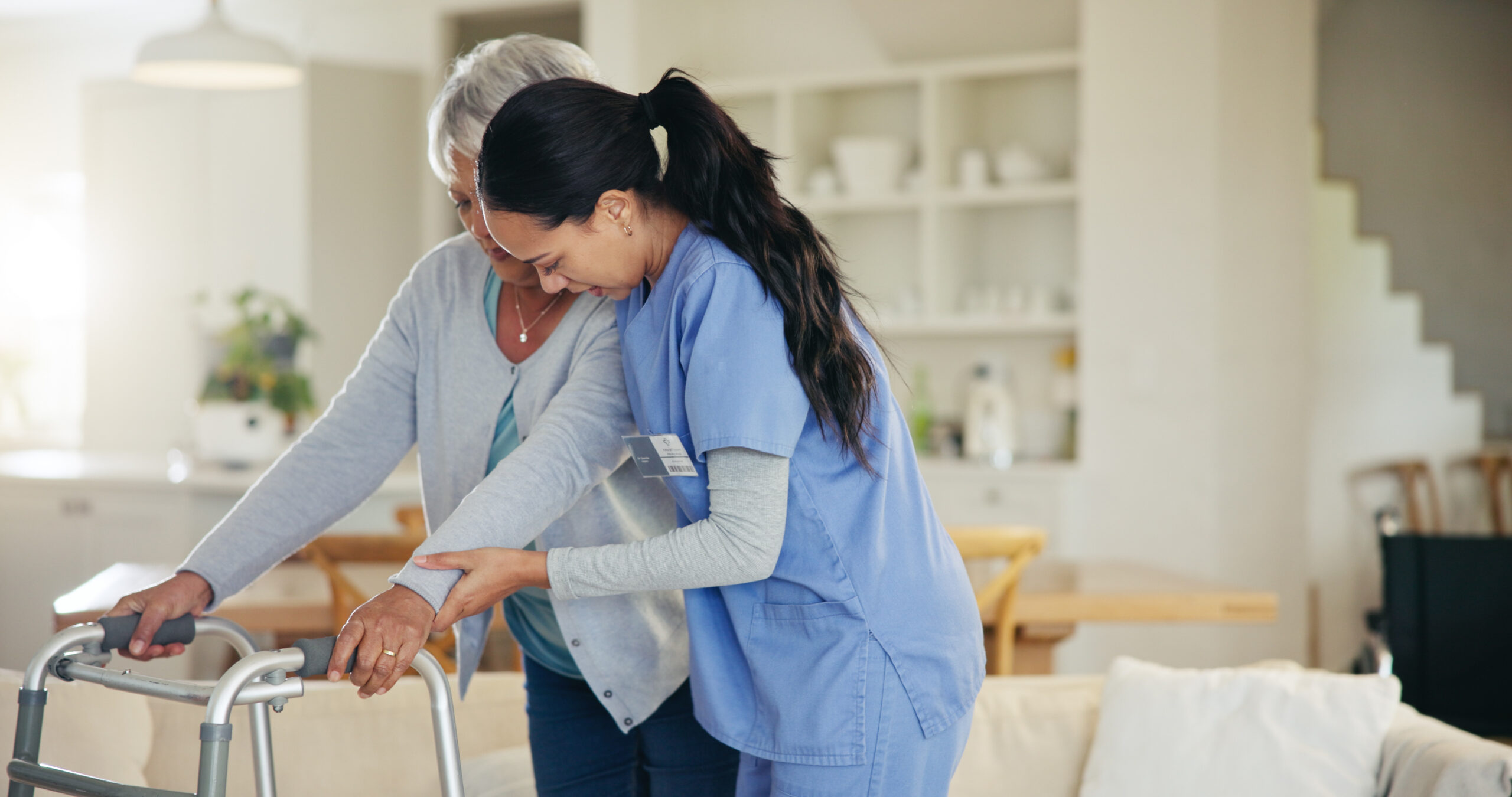 senior-woman-person-with-disability-walking-frame-support-nurse-handholding-healthcare-elderly-medical-care-patient-rehabilitation-physiotherapy-injury-recovery